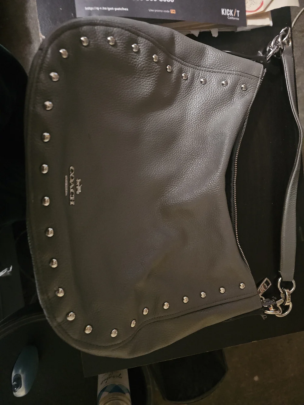 COACH Pebbled Leather Hobo Bag in Gray with Stud Accents